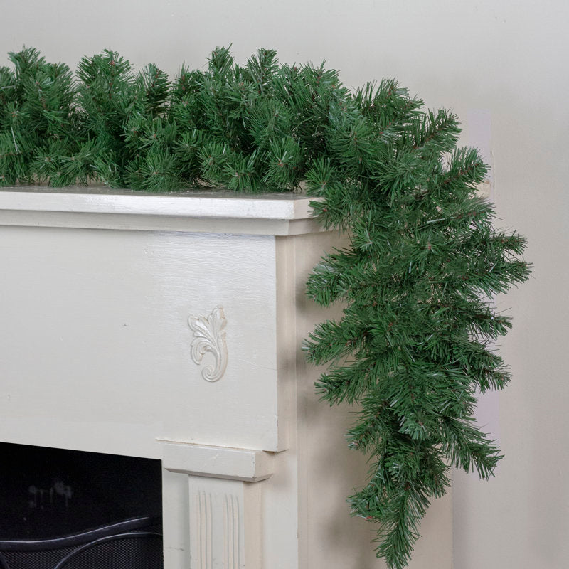 6 ft Pre-Lit Pine Christmas Garland styled along a festive mantel