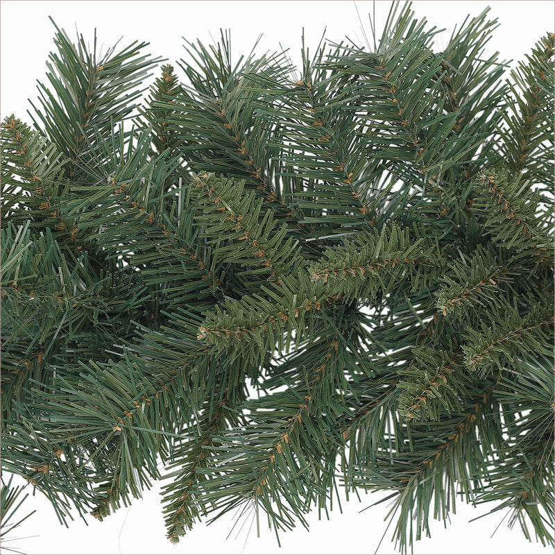 5 ft Artificial Pine Christmas Garland draped across a fireplace mantel
