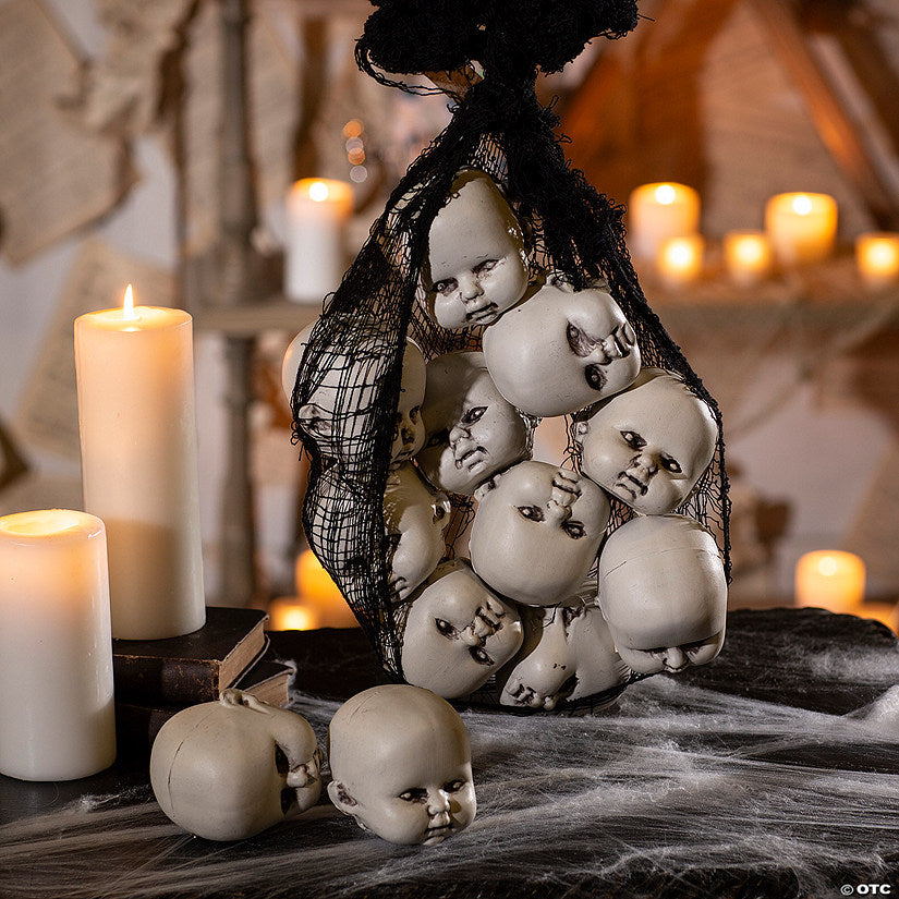 3 1/2" Halloween Plastic Doll Heads in Mesh Bag - 12 Pc. | USA Decoration®