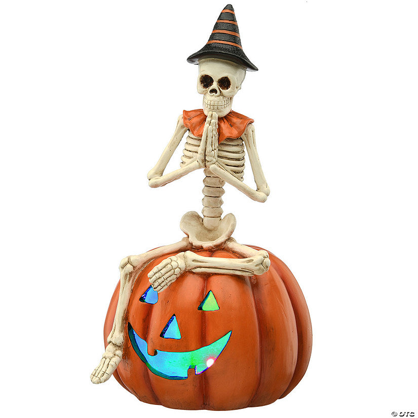 Each: National Tree Company 12 in. Skeleton Sitting on Pumpkin | USA Decoration®