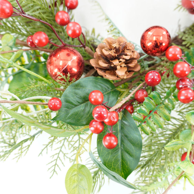 Christmas Wreath hung on a wooden door