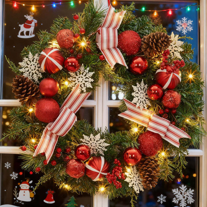 24" Flocked Pine Christmas Wreath hanging on a front door