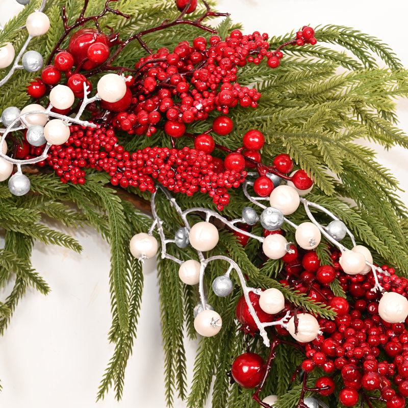 24" Pre-Lit Artificial Fir Christmas Wreath hanging on a front door