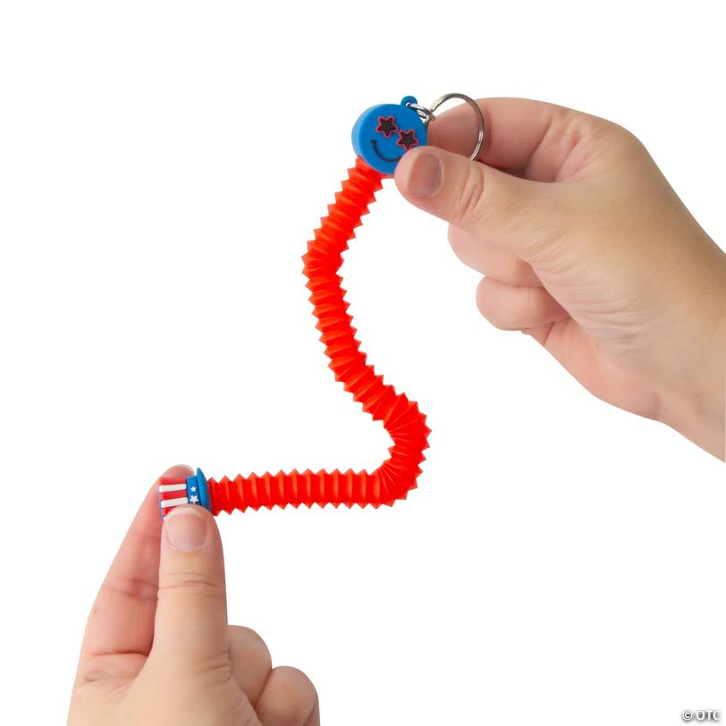 4" Patriotic Expanding Tube Smile & Star Plastic Fidget Toy Keychains - 12 Pc.