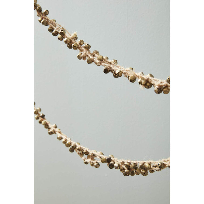 10" Artificial Pine Christmas Garland draped across a fireplace mantel