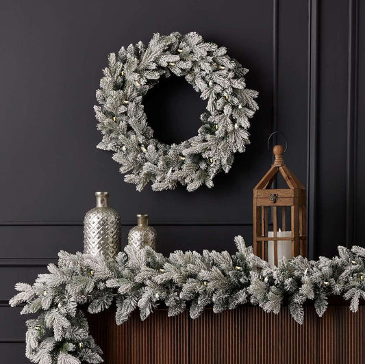 9' Flocked Shadow Woods Spruce Garland with Warm White LED Lights Pre-Lit Plug-In Holiday Garland for Mantels, Doors & Staircases