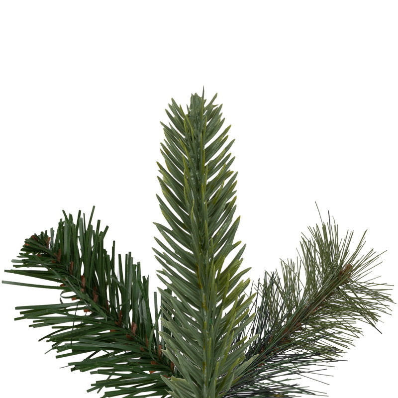 12" Artificial Pine Christmas Wreath displayed on a front door