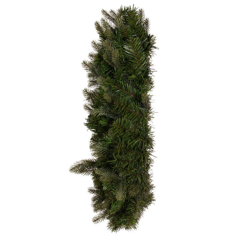 Christmas Wreath hung on a wooden door