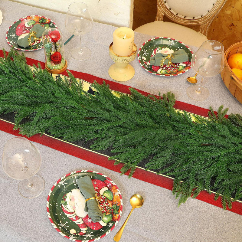 6 ft Gold Pre-Lit Fir Christmas Garland wrapped around a staircase banister
