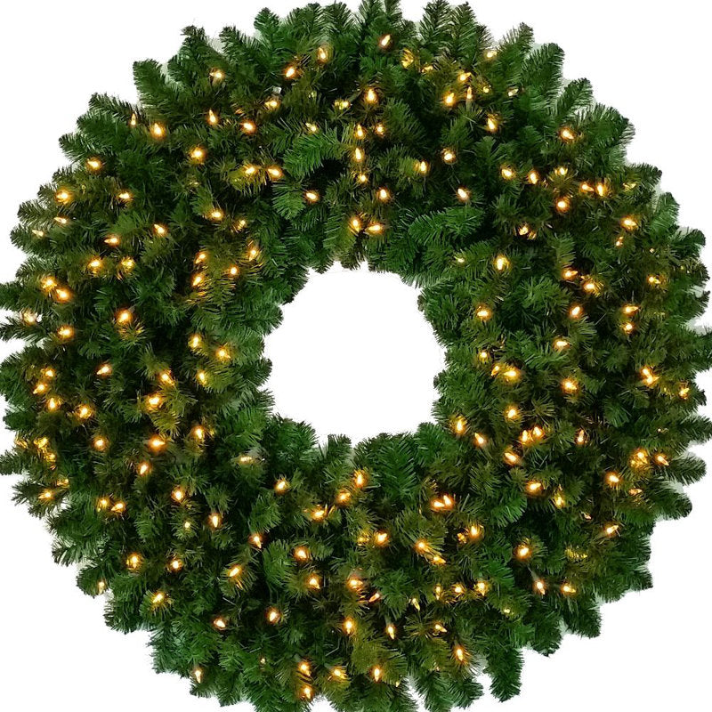 Pre-Lit Christmas Wreath hung on a wooden door