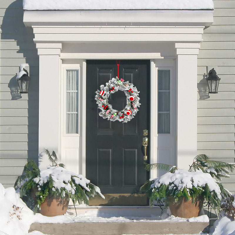 28" Cedar Christmas Wreath hung on a wooden door