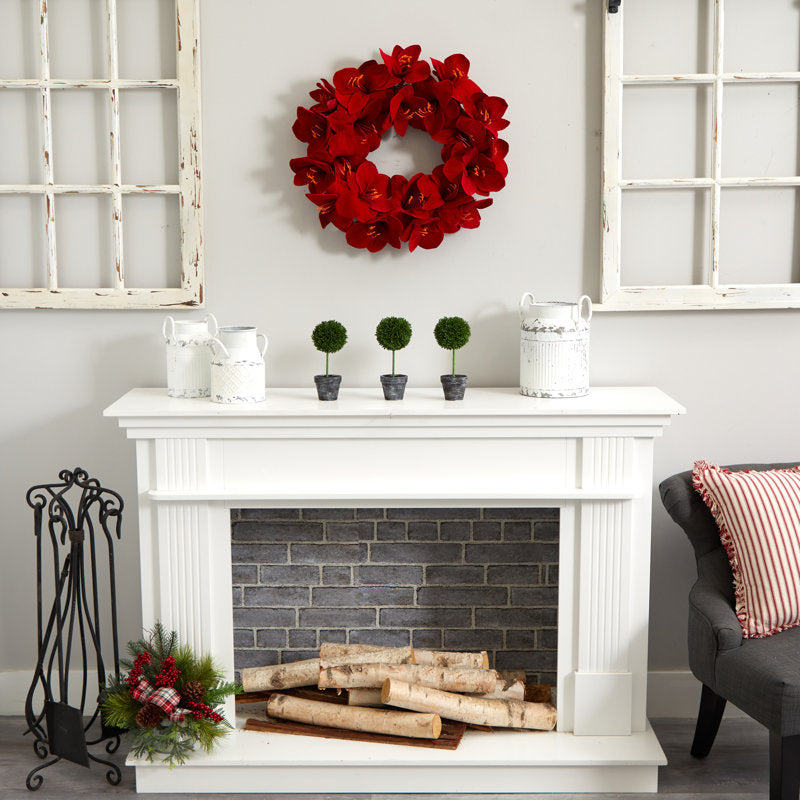 24" Flocked Pine Christmas Wreath as a festive door display