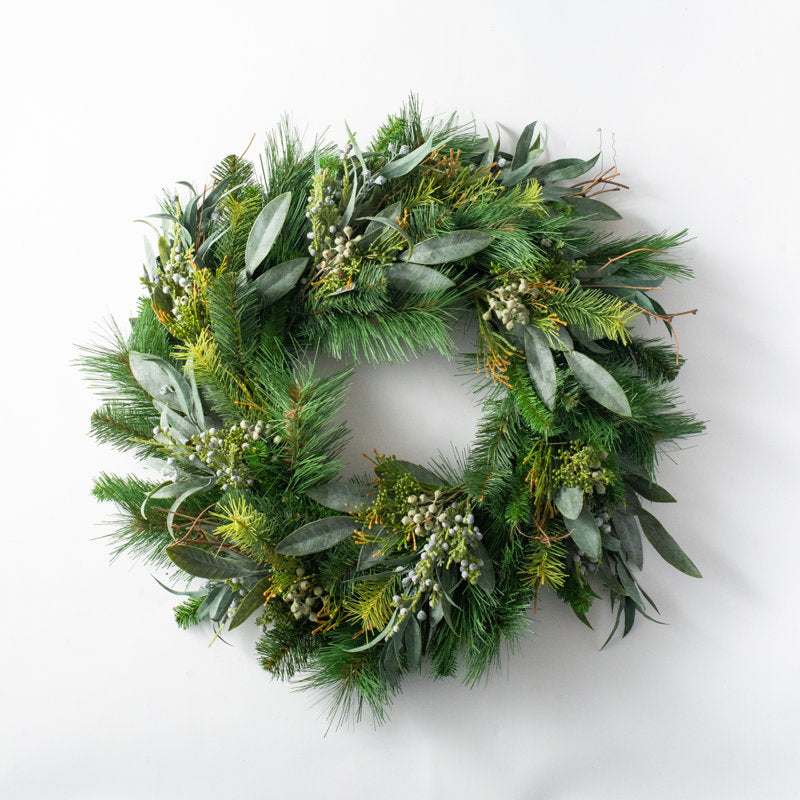 Artificial Eucalyptus Christmas Wreath hanging on a front door