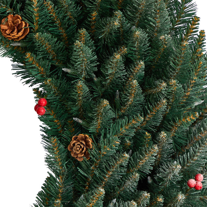 12" Artificial Christmas Wreath displayed on a front door
