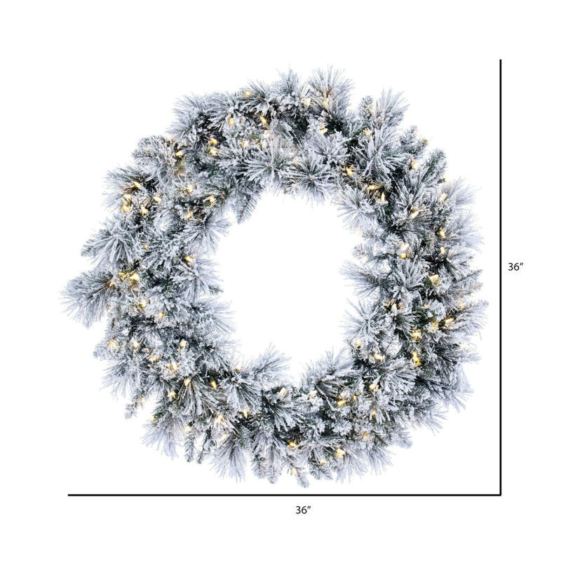 48" Christmas Wreath hanging on a front door