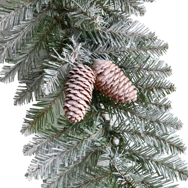22" Cypress Christmas Wreath hanging on a front door