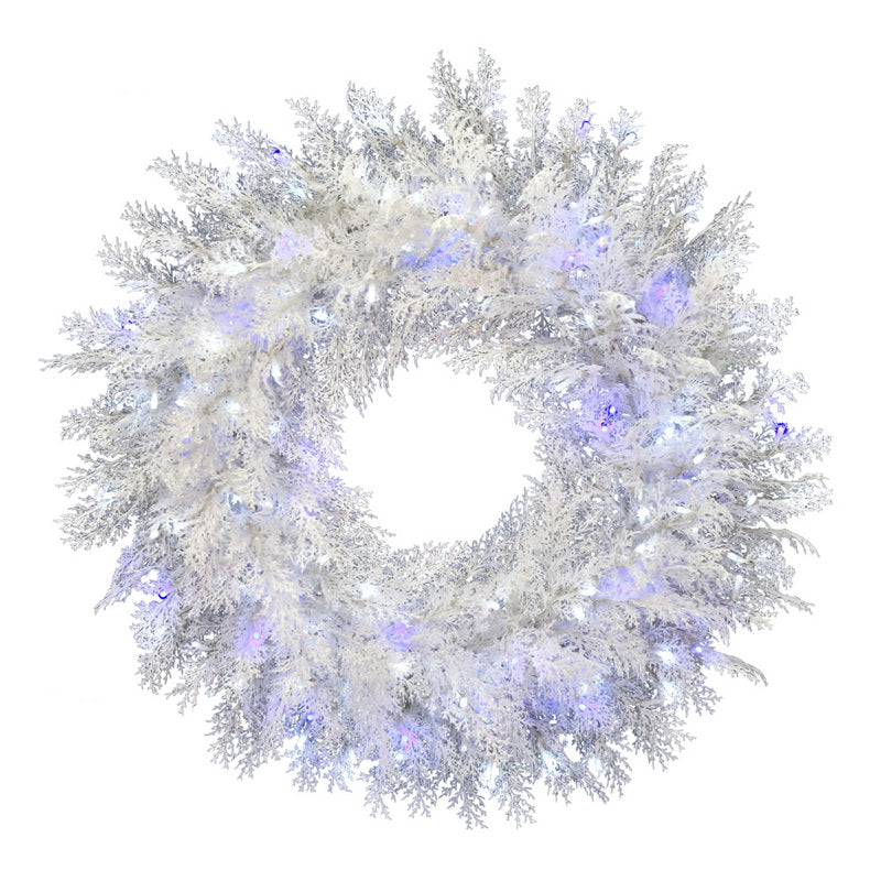 Artificial Pine Christmas Wreath hung on a wooden door