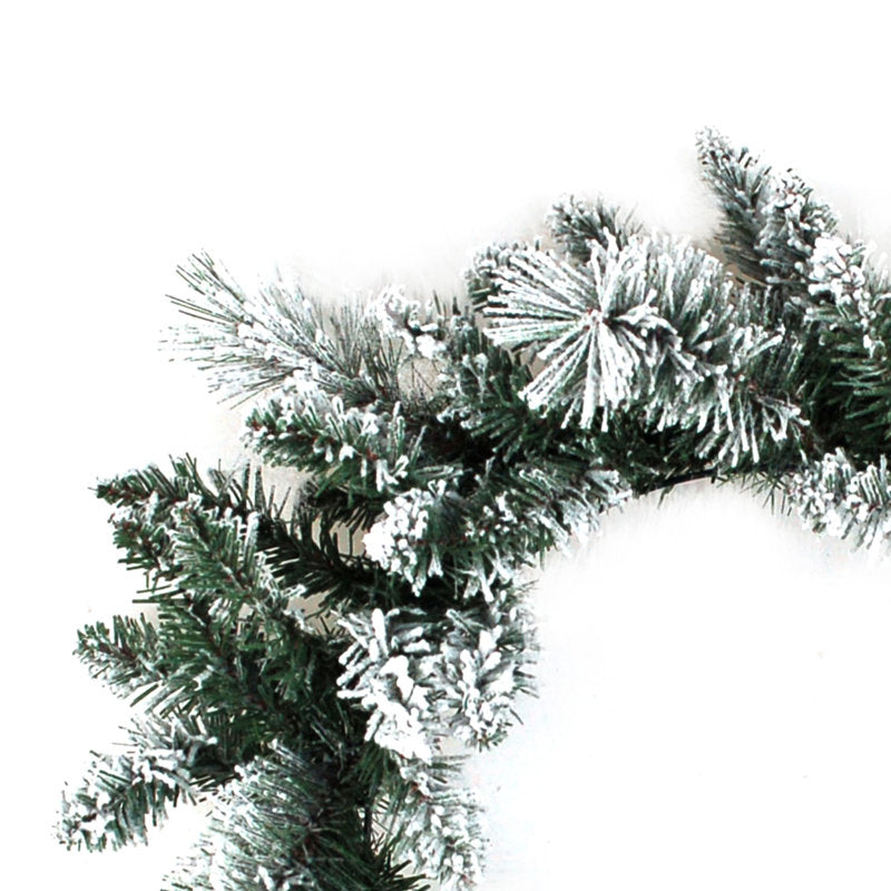 28" Artificial Pine Christmas Wreath hanging on a front door