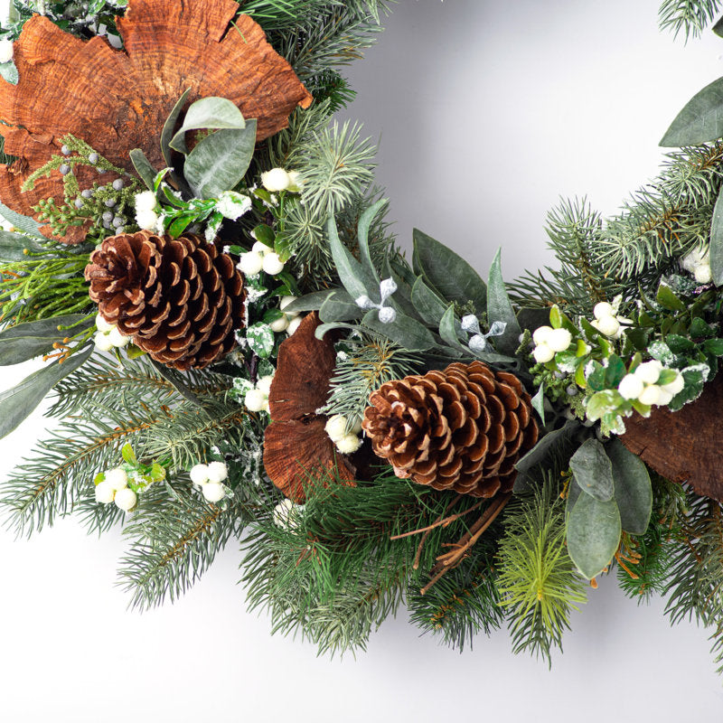 26" Eucalyptus Christmas Wreath hanging on a front door