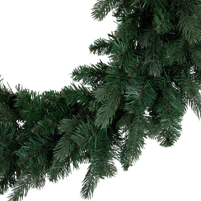 Christmas Wreath hung on a wooden door