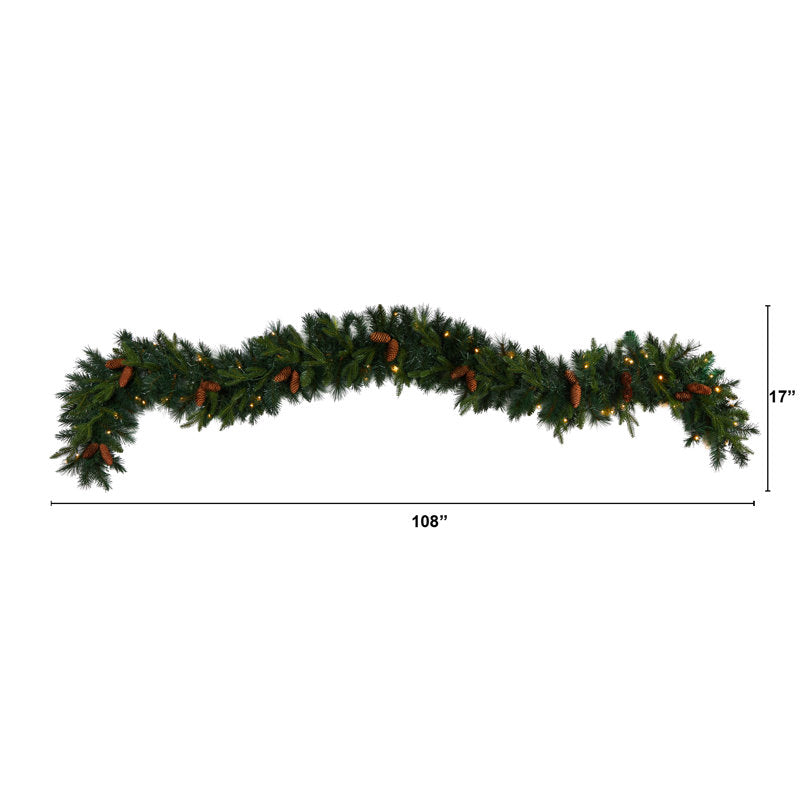 5.9 ft Artificial Berry Christmas Garland styled along a festive mantel