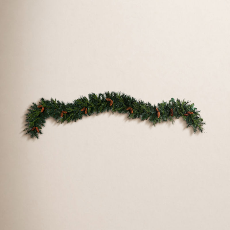 5.9 ft Artificial Berry Christmas Garland styled along a festive mantel