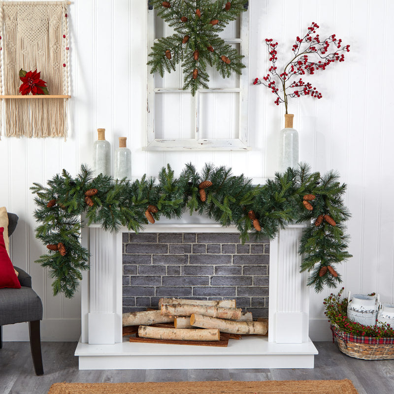 5.9 ft Artificial Berry Christmas Garland styled along a festive mantel
