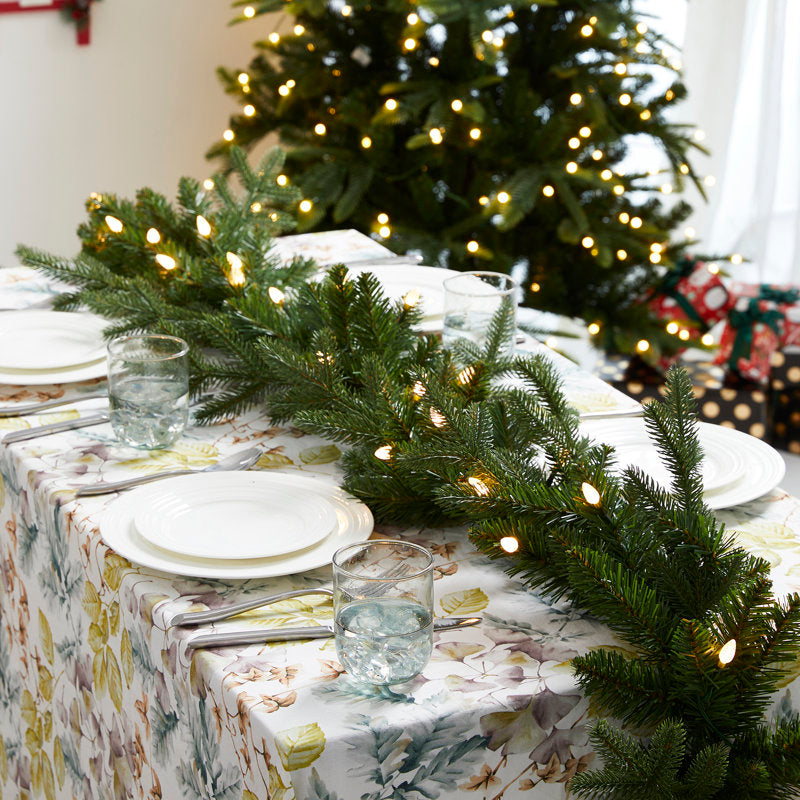 111" Berry Christmas Garland wrapped around a staircase banister