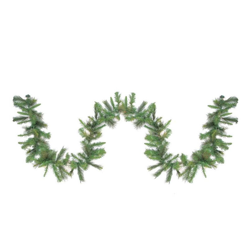 Pre-Lit Artificial Christmas Garland framing a front doorway