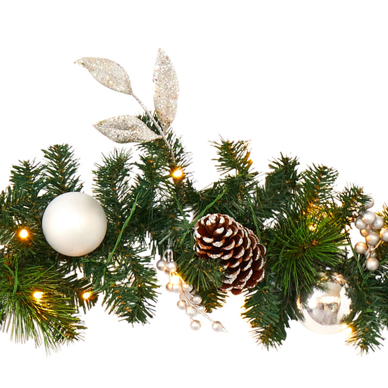 Real Touch Artificial Norfolk Pine Christmas Garland framing a front door