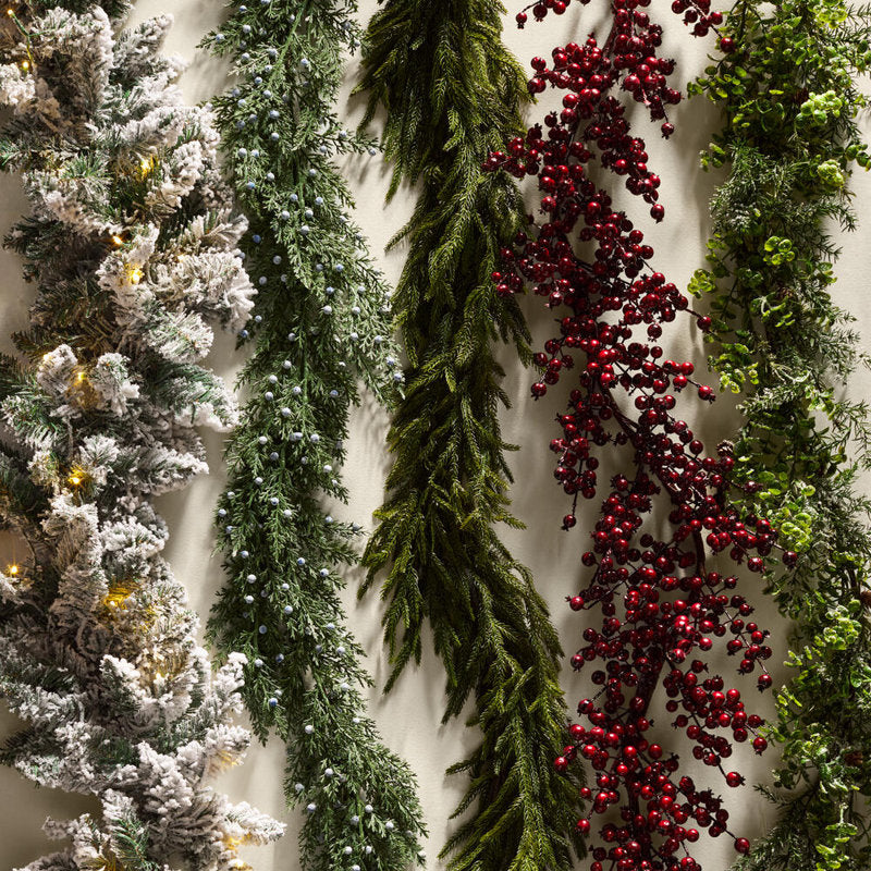 6 ft Pre-Lit Artificial Pine Christmas Garland framing a front doorway