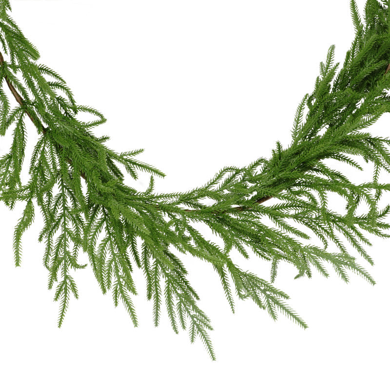 9 ft Frosted Christmas Garland styled along a festive mantel