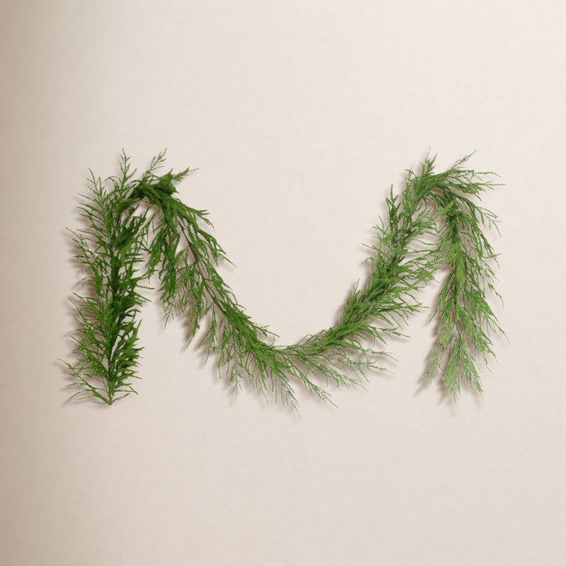 9 ft Frosted Christmas Garland styled along a festive mantel