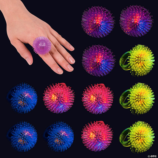 1 3/4" Pink, Purple, Blue Yellow Flashing Spike Rings - 12 Pc. | USA Decoration®