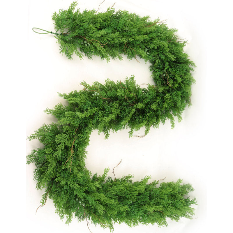 6 ft Pre-Lit Artificial Pine Christmas Garland framing a front door