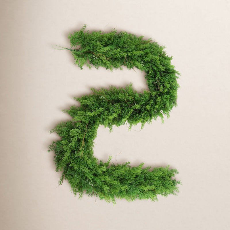 6 ft Pre-Lit Artificial Pine Christmas Garland framing a front door