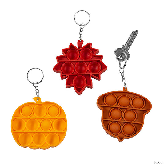 6 Piece(s): 3" x 3" Fall Leaf, Acorn & Pumpkin Lotsa Pops Pop Fidget Toy Keychains – 6 Pc. | USA Decoration®