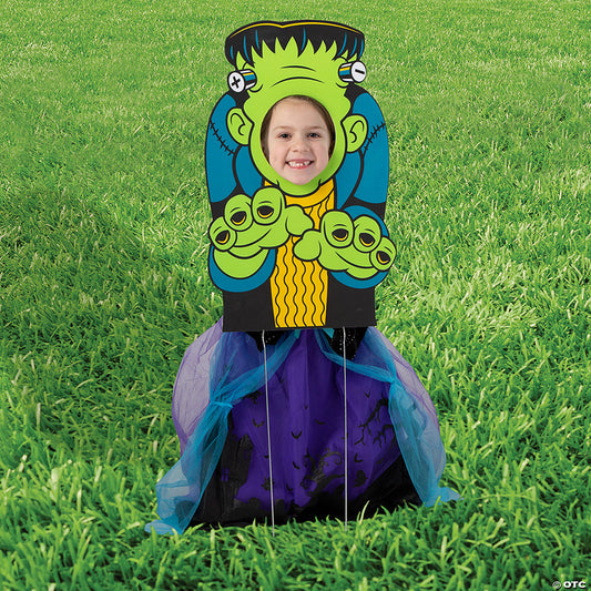 1 Piece(s): 15" x 24" Green Monster Face Yard Sign | USA Decoration®