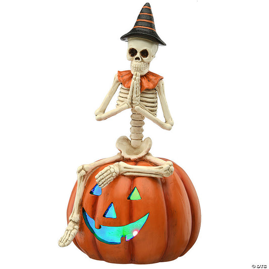 Each: National Tree Company 12 in. Skeleton Sitting on Pumpkin | USA Decoration®