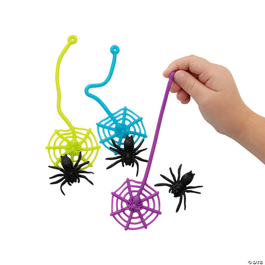 24 Set(s): 2" x 6" Halloween Sticky Vinyl Web with Black Spider - 24 Pc. | USA Decoration®