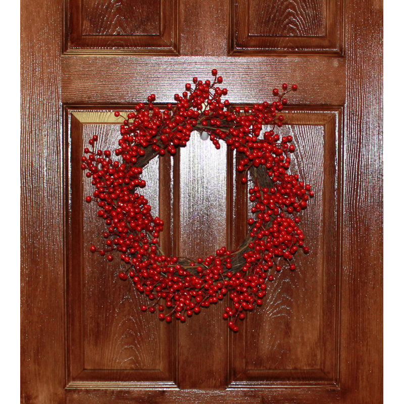 Pine Christmas Wreath displayed on a front door