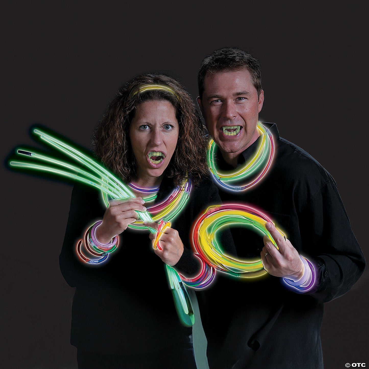 2 1/2" Bulk 504 Pc. Glow-in-the-Dark Plastic Fangs Vampire Teeth | USA Decoration®