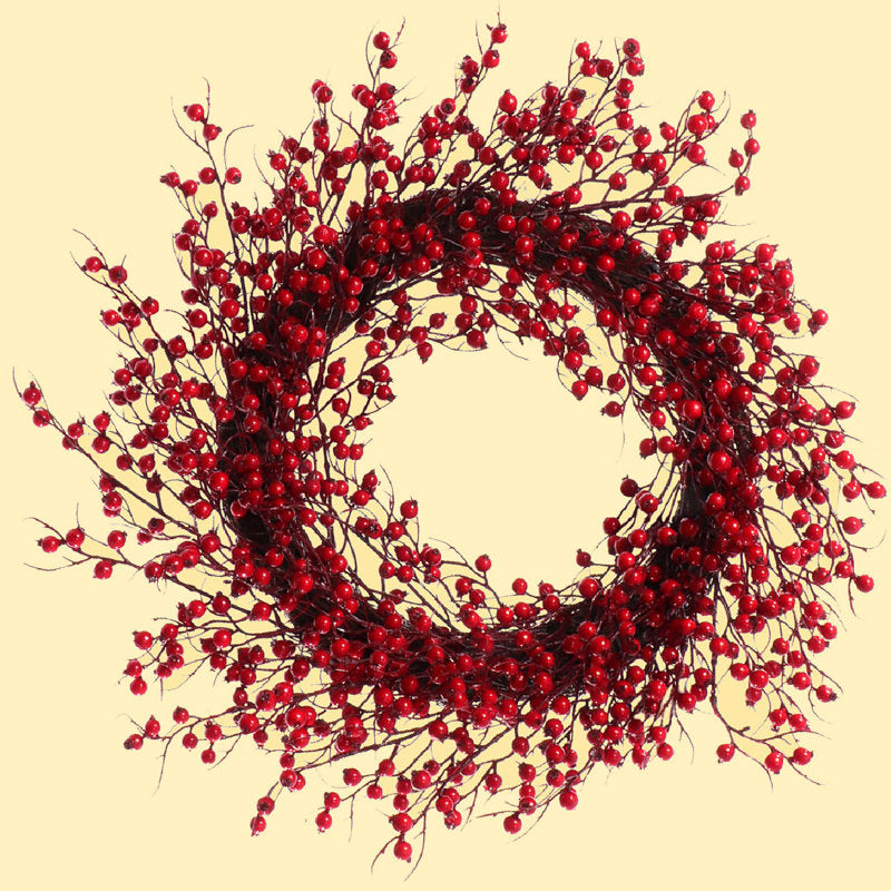 Artificial Christmas Wreath hung on a wooden door