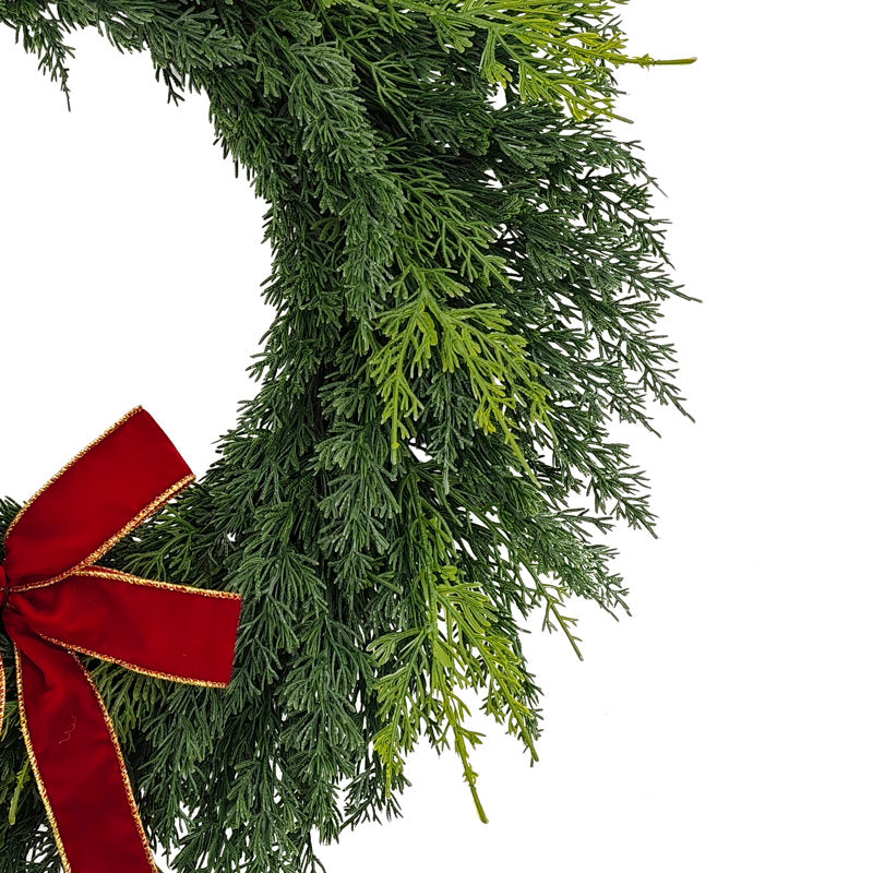 Pine Christmas Wreath displayed on a front door