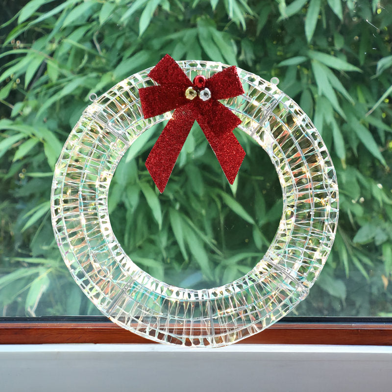 24" Christmas Wreath displayed on a front door