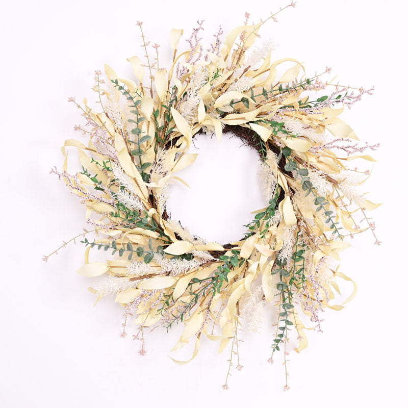 24" Farmhouse Artificial Eucalyptus Christmas Wreath hung on a wooden door