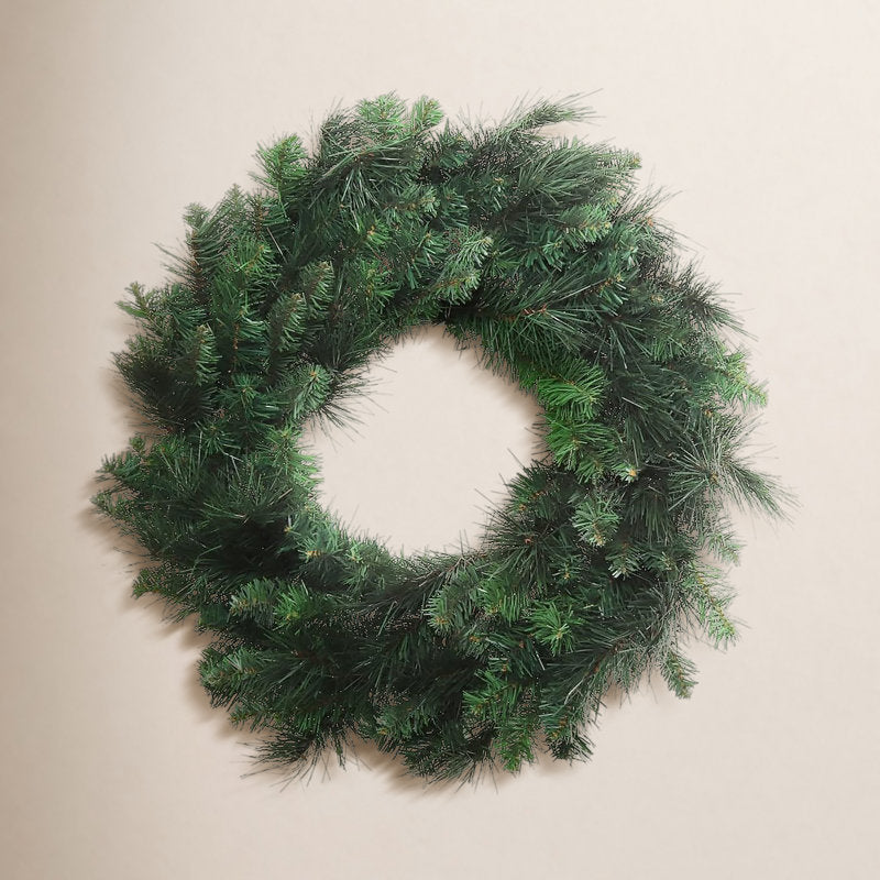 28" Pre-Lit Artificial Christmas Wreath hung on a wooden door