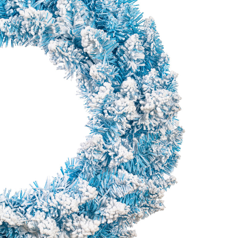 Christmas Wreath hung on a wooden door