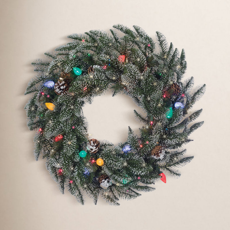 Artificial Fir Christmas Wreath displayed on a front door