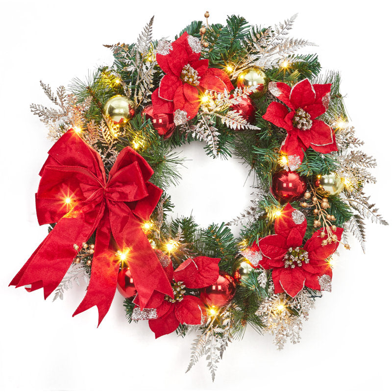 24" pre-lit poinsettia Christmas wreath with poinsettias and a velvet bow